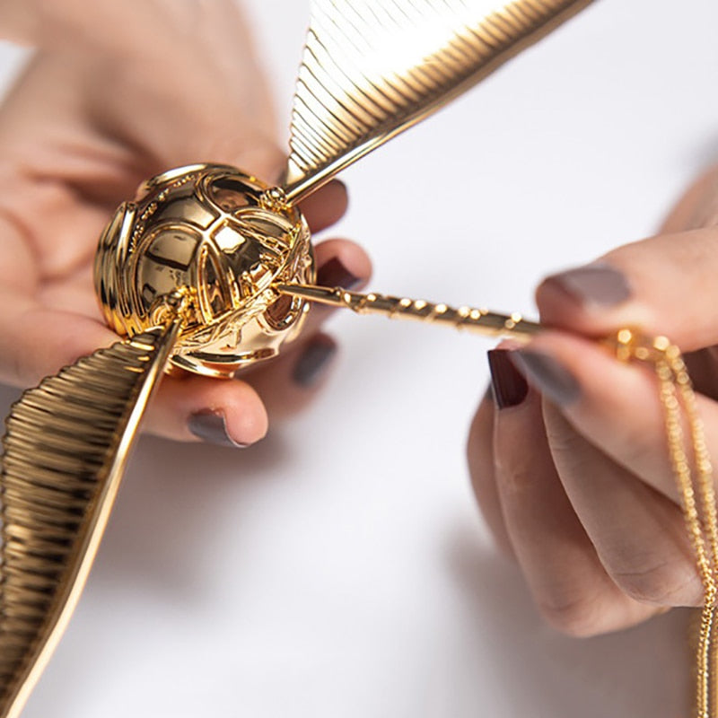 Goldene Flügel-Orb-Ringbox – Luxuriöse bewegliche Schmuckschatulle