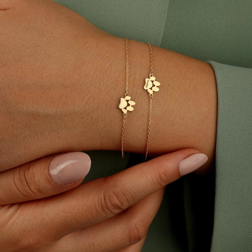 Liebenswerte Pfotenabdruck-Armband – Eine warme Erinnerung an deinen treuen Freund