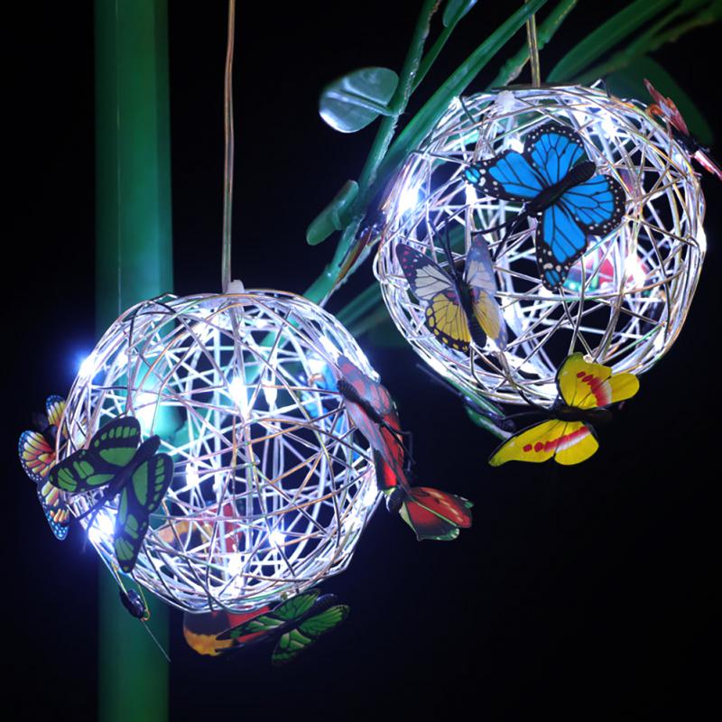 GlowSphere – Solarbetriebene LED-Gartenleuchte mit Schmetterlingsdesign.
